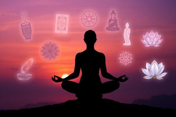 The Rise of Eclectic Spirituality: Crafting Personalized Paths Beyond Dogma Person meditating at sunset with various spiritual symbols floating around them, representing eclectic spirituality and non-dogmatic paths